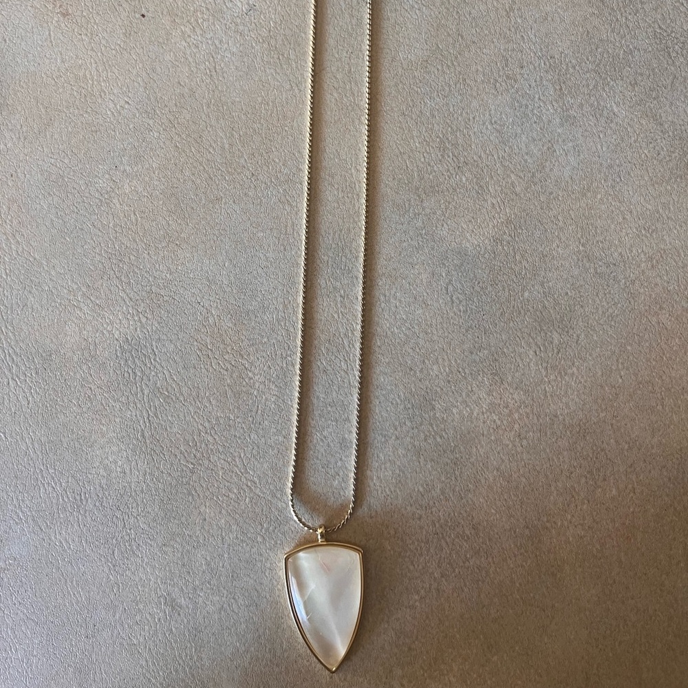 Elegant Gold Necklace with White Pendant